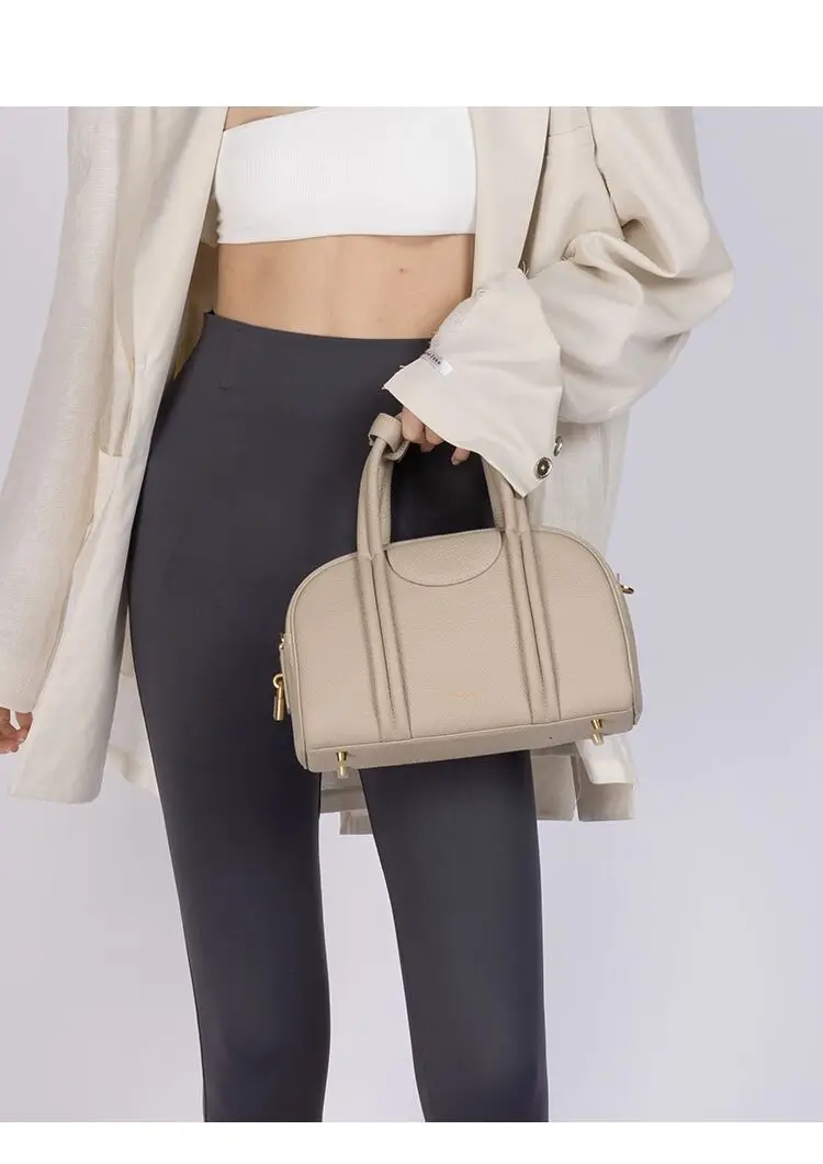 Trendy and stylish, minimalist bowling bag series, large capacity retro cowhide top layer, one shoulder portable crossbody bag