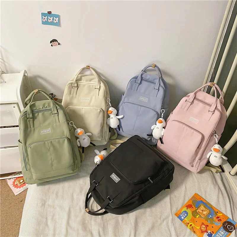 

College style niche student schoolbag 2021 Korean version casual large-capacity junior high school student backpack