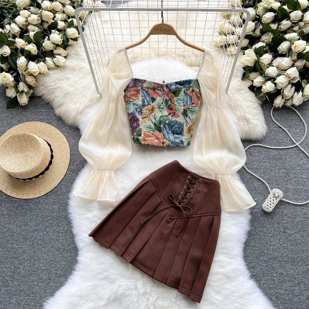 

New College Style Age Reduction Bubble Sleeve Tops Paired with High Waist Pleated Skirt Two-piece Set