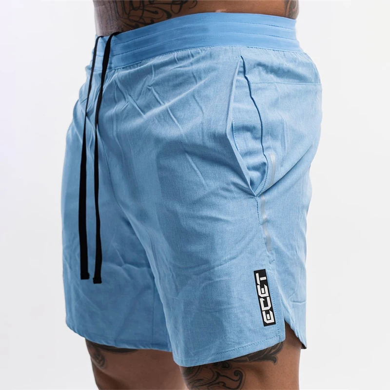 Summer new casual pants quick-drying men's shorts printing fitness sports pants fashion beach casual swimming trunks