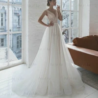illusion white tulle sequin v neck wedding dress vestidos de novia luxury beading a line bridal gowns trouwjurk %d1%81%d0%b2%d0%b0%d0%b4%d0%b5%d0%b1%d0%bd%d0%be%d0%b5 %d0%bf%d0%bb%d0%b0%d1%82%d1%8c%d0%b5