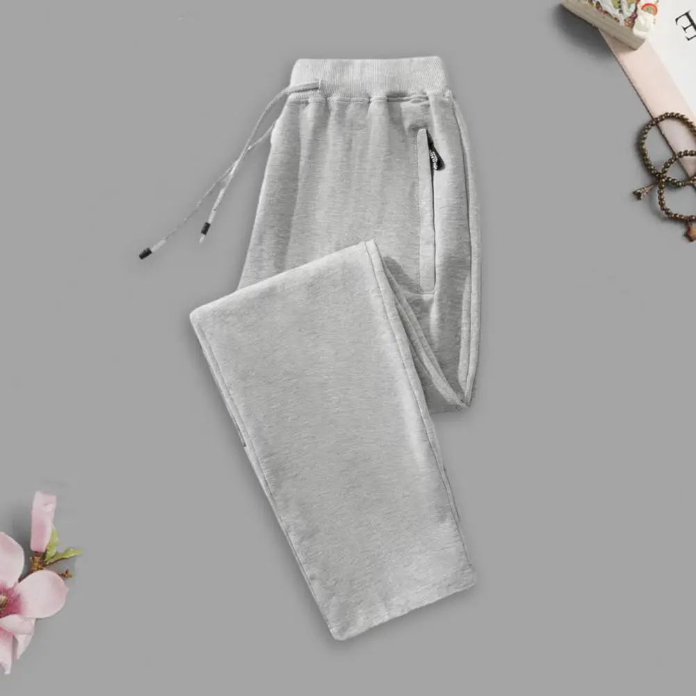 

Solid Color Men Trousers Men Casual Pants with Pockets Breathable Sports Trousers with Elastic Waist Zipper Pockets Drawstring