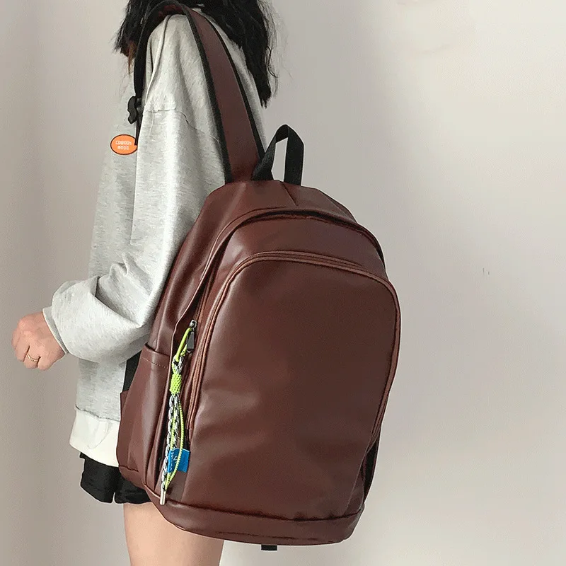 Advanced retro backpack simple texture soft leather large-capacity computer backpack male high school college student women's sc