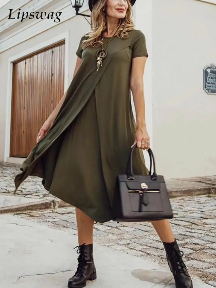 

Женское асимметричное длинное платье с круглым вырезом и коротким рукавом