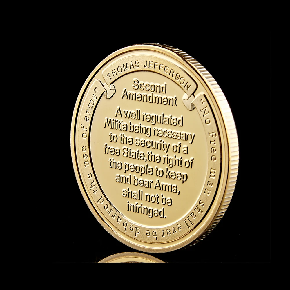 Коллекционная позолоченная монета с изображением американского хранителя