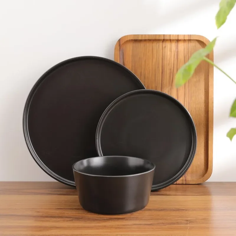 

Luxurious Stoneware 12-Piece Round Dinnerware Set by Lain Cecile - Rich Black with Contrasting Bands, Perfect for Any Table Sett