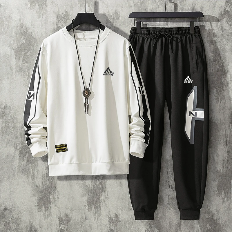

Autumn New Men Tracksuit Casual Solid Sports Set Long Sleeved TShirt 2 Pieces Sets+Pants Fashion Brand Jogger Fitness Sportswear