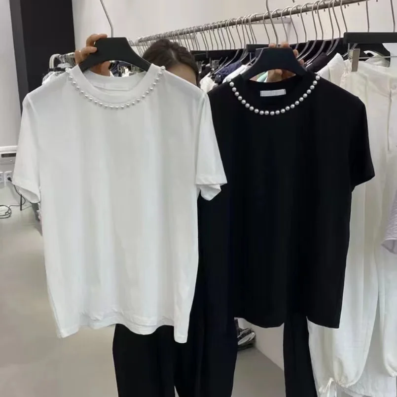 Женская свободная футболка с бусинами