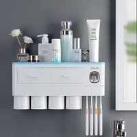 magnetic adsorption inverted toothbrush holder automatic toothpaste squeezer dispenser shelf storage rack bathroom accessories