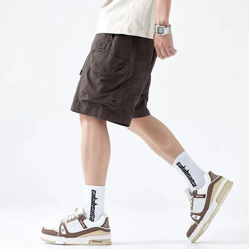 Лето 2024 модные мужские шорты свободный крой повседневный стиль длина пяти минут