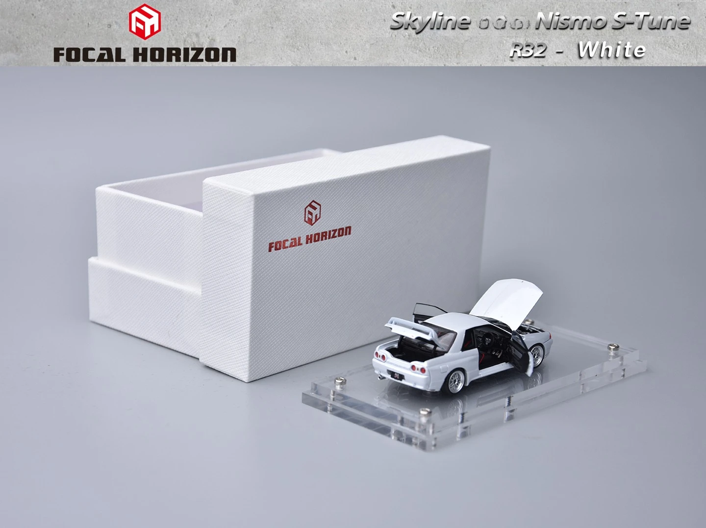 Фото Литая под давлением модель автомобиля Focal Horizon FH 1:64 Skyline R32 Nismo S-Tune Bayside White №1