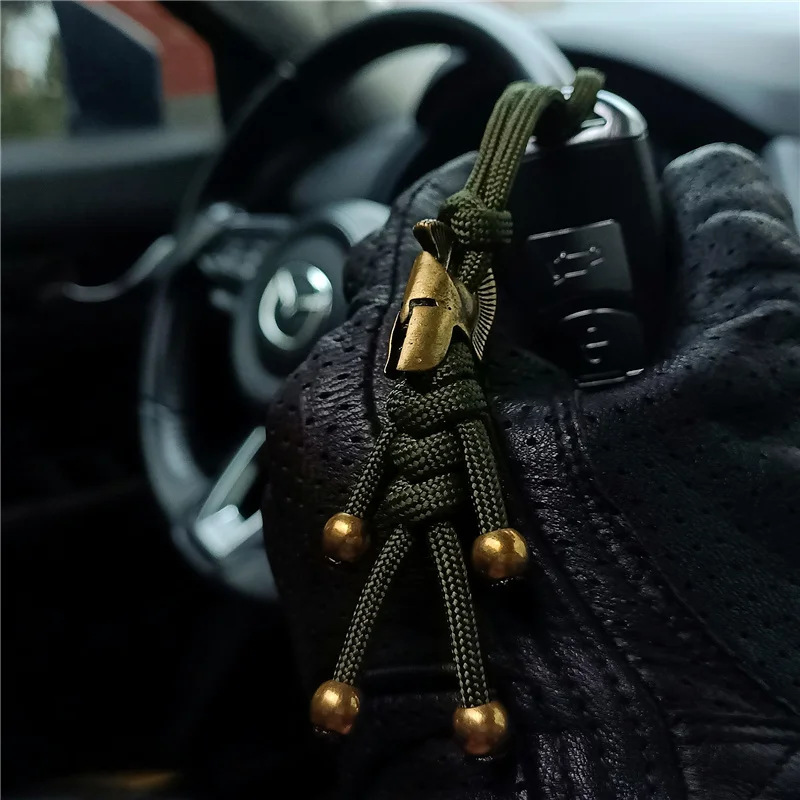 

1 шт., Спартанский брелок для ключей, подвеска для автомобиля, байкера, шлема, брелок, плетеная веревка, Паракорд, Бадди, сумка, подвеска на рюкзак, кукла, игрушка