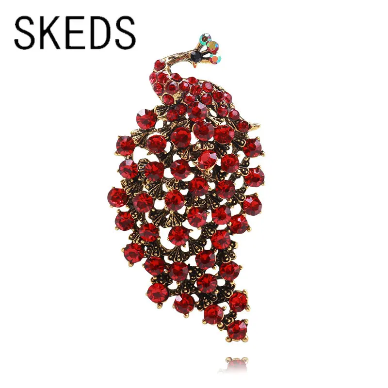 

SKEDS Fashion Women Full Crystal Peacock Luxury Brooch Pin Shining Boutique Decoration Badges For Lady Clothing Coat Jewelry