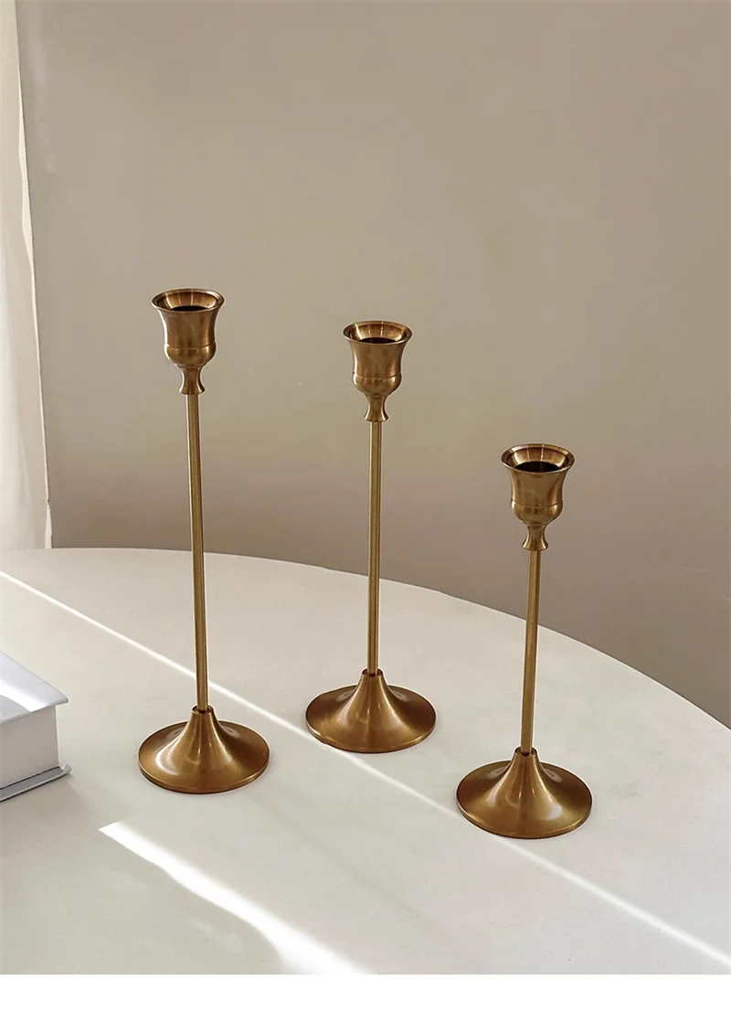 

Золотые подсвечники из латуни