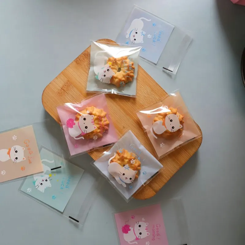 

500 шт./компл. пластиковые пакеты из ОПП с изображением милого кота для конфет, печенья, упаковочные пакеты, товары для свадебной вечеринки