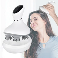 electric scalp massager with four massage modes that imitate four finger kneading charging base included portable waterproof