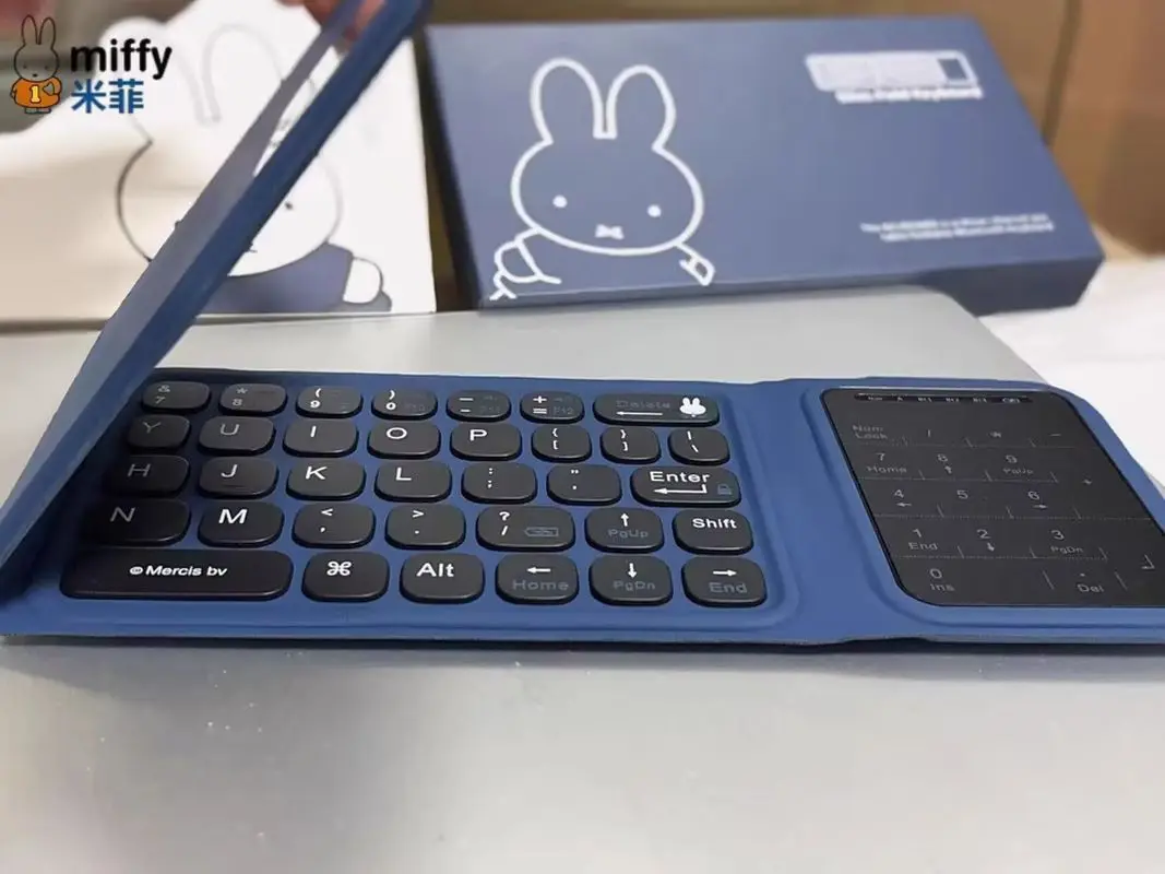 Фото Беспроводная Bluetooth-клавиатура Miffy Tri Fold, ультратонкая, бесшумная, миниатюрная, портативная, для 3 устройств: iOS, Android, Windows Phone, iPad, планшетов №4