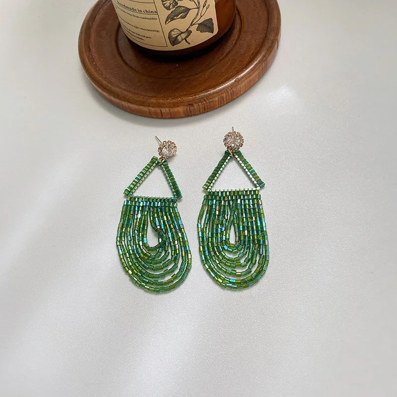 

Hand-woven beaded earrings triangular tassel pendant earrings