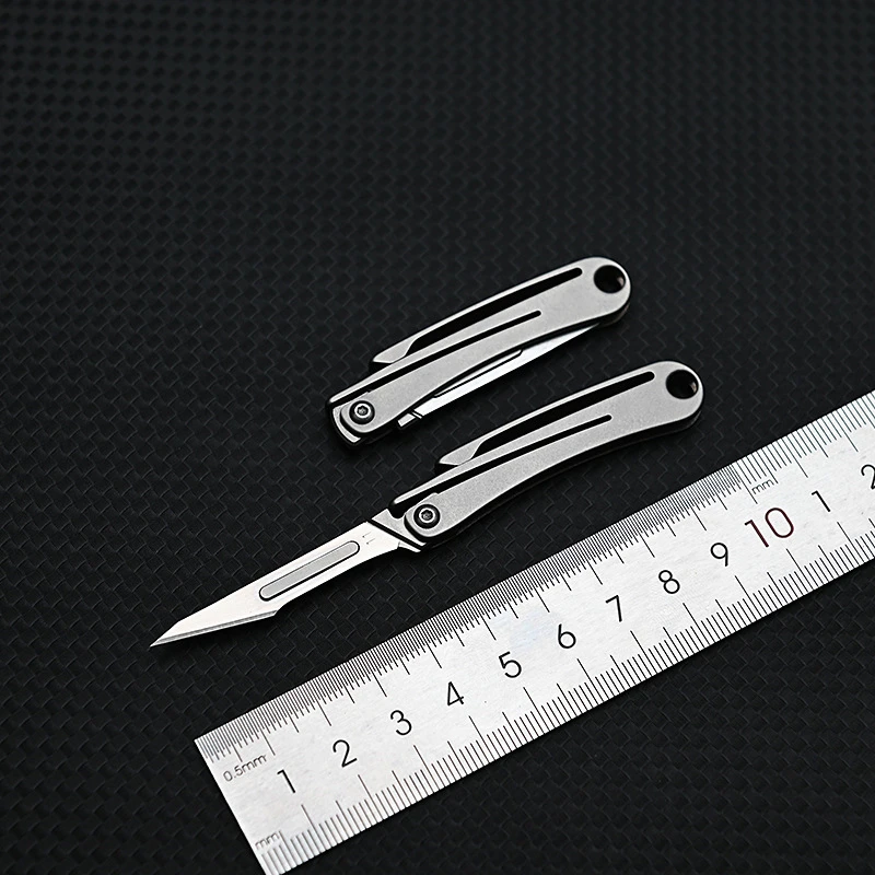 

Titanium Alloy Mini Folding Knife Sharp Art Paper Cutter Replaceable Blade Portable Unpacking Express Key Chain Knife