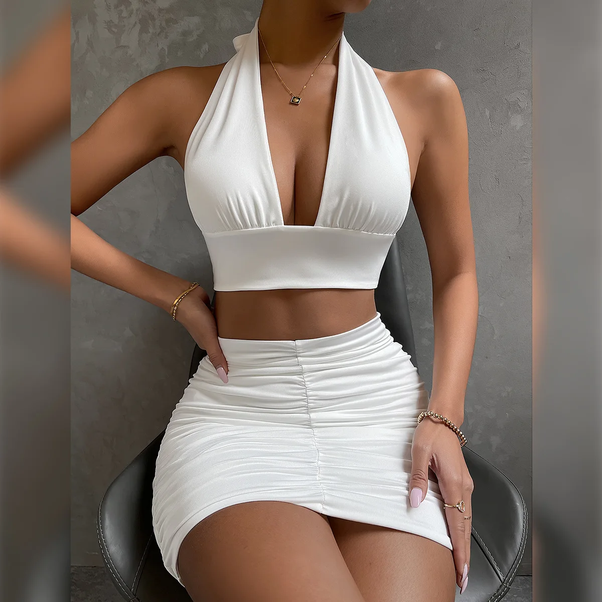 

Two Piece Sets Sexy Backless Dress Club Outfits for Women 2022 Summer Bodycon Sleeveless Halter Crop Top and Mini Skirt Suits
