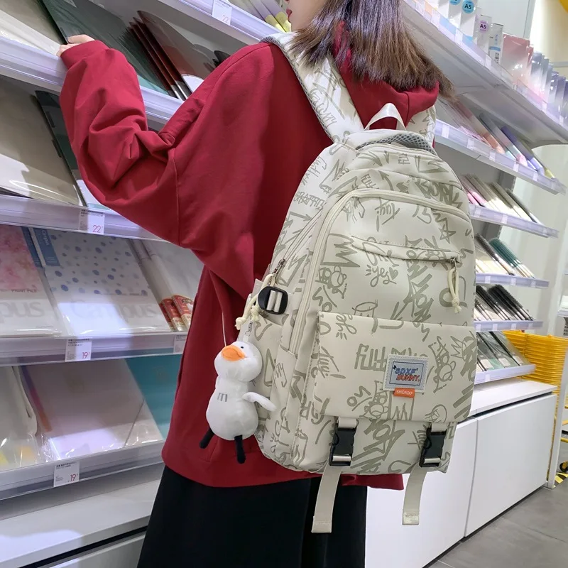 

New Japanese Ins Simple Fashionable Graffiti Junior High School Backpack Schoolbag Girl Outdoor Travel Backpack College Students