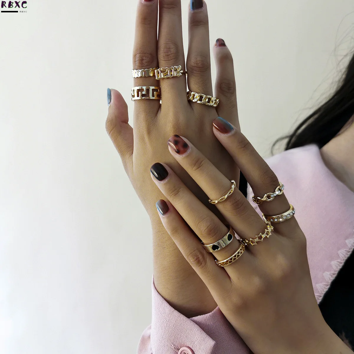 

RBXC Jewelry versatile sweet cool popular heart-shaped hand ornaments female personality multiple hollow out geometric set ring