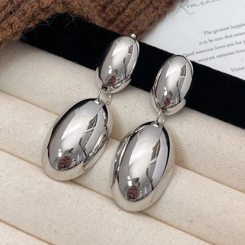 Очаровательные геометрические серьги-гвоздики из 18-каратного золота большие