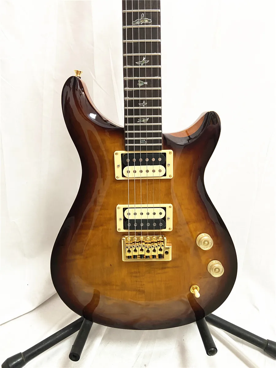 

High quality custom edition 24 6 string electric guitar Tiger grain maple veneer gold accessories Tremolo free shipping