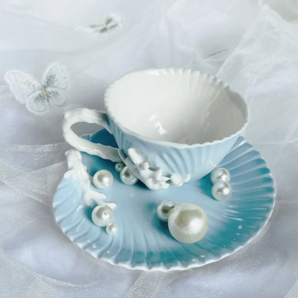 

European ceramic coffee cups and saucers hand-painted embossed underglaze matte ocean blue coral shells Mediterranean wind