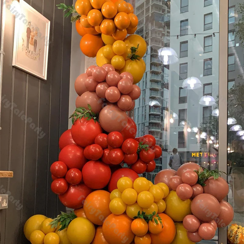 Ярко-оранжевые и пыльные розовые воздушные шары в форме тыквы для украшения