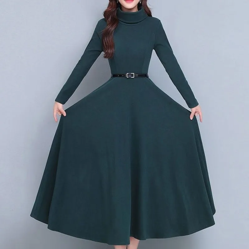 Женский осенне-зимний пуловер с высоким воротником и поясом оборками