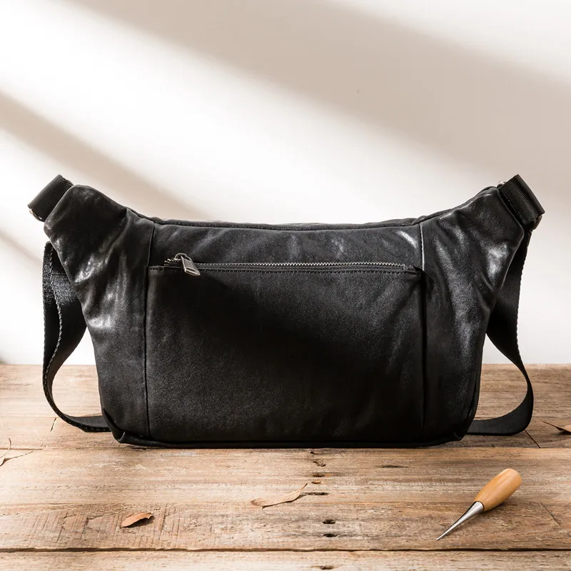 Simple casual designer first layer cowhide men's black large-capacity chest bag outdoor daily weekend real leather messenger bag