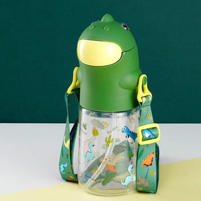

1Pcs New 560mL Cute Dinosaur Children Plastic Bottle with Bouncing Lid and Portable Cup Strap Creative Leakproof Kid Plastic Cup