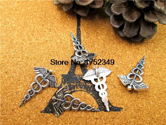 

150pcs--Antique Tibetan Silver Caduceus Medical Symbol Staff With Wings Snakes Charms 30x20mm