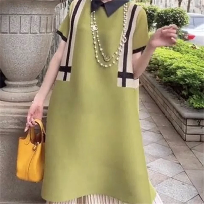 

Folding dress female loose short -sleeved doll collar color 2022 Summer new foreign casual patchwork reduction A -line dress