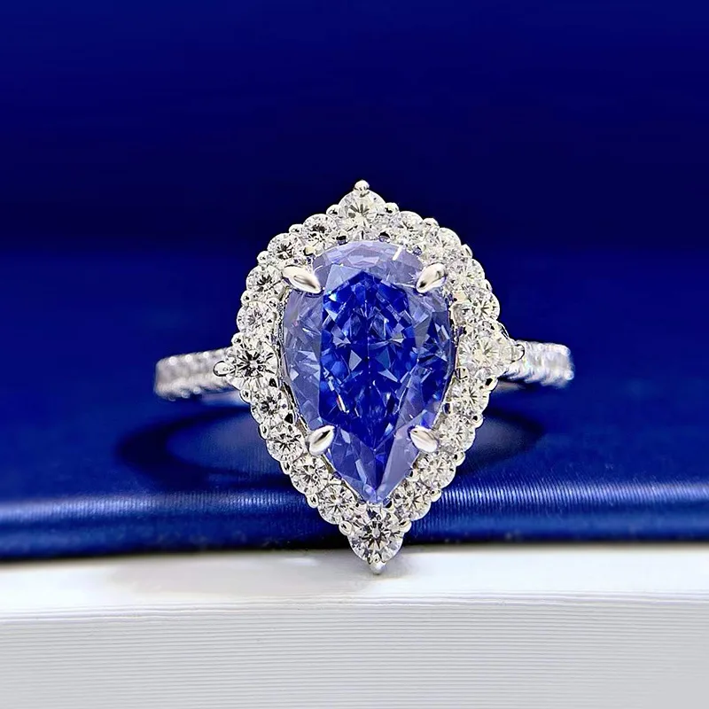 

Europe America Style Ring 925 Sterling Silver Setting Pear-shaped Created Tanzanite Full Zircon Women Lady Engagement Rings