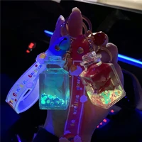 liquid into the oil keychain luminous perfume floating bottle design female pendant couple leather bag ornaments wholesale