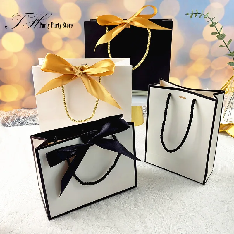 10Pcs/Lot New White Black Bow High Quality Simple Gift Bag Kraft Paper Candy Box With Handle Wedding Birthday Party - купить по