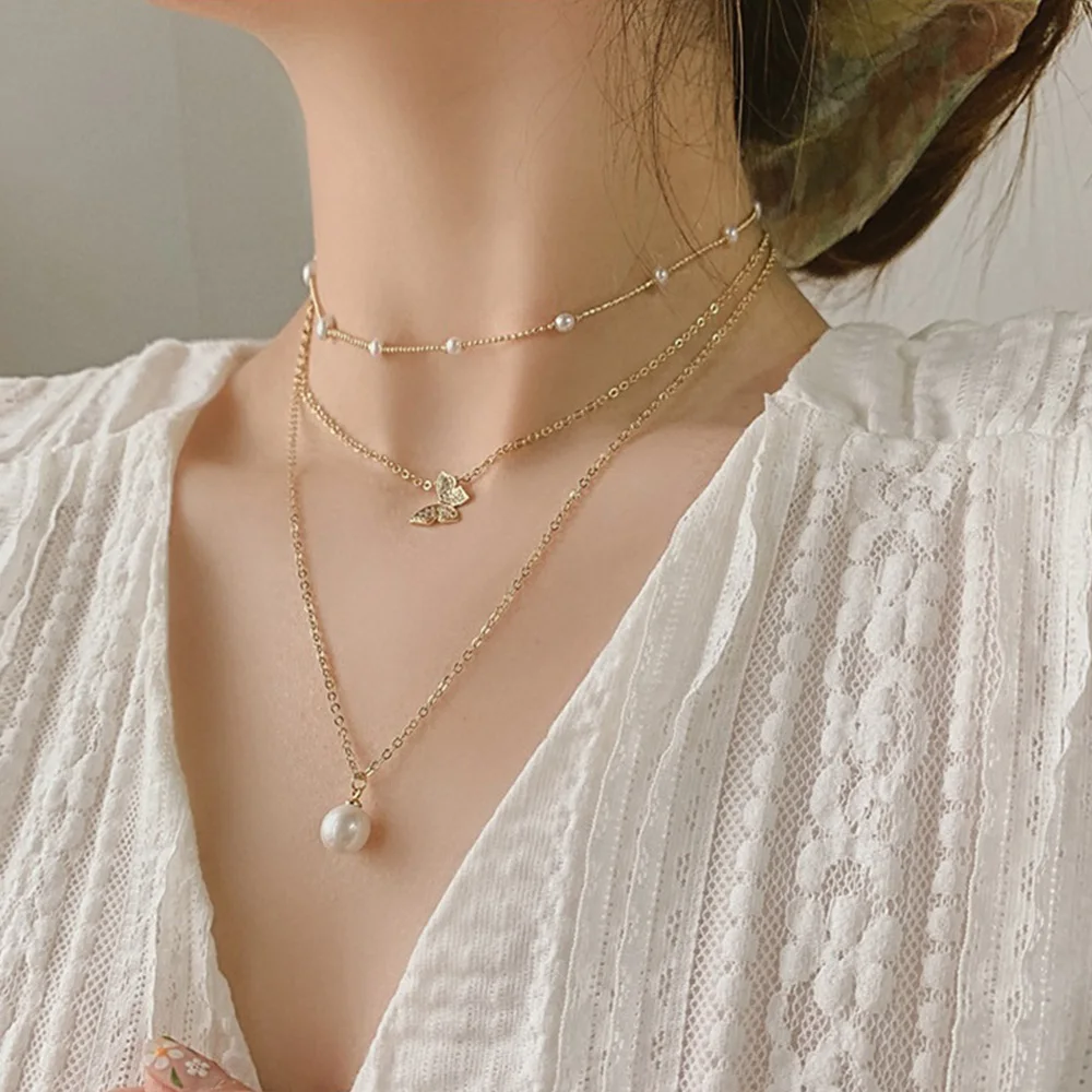 

Ladies Temperament Collares Short Multi Layer Jewelry Clavicle Chain Choker Butterfly Necklace Pearl Necklace
