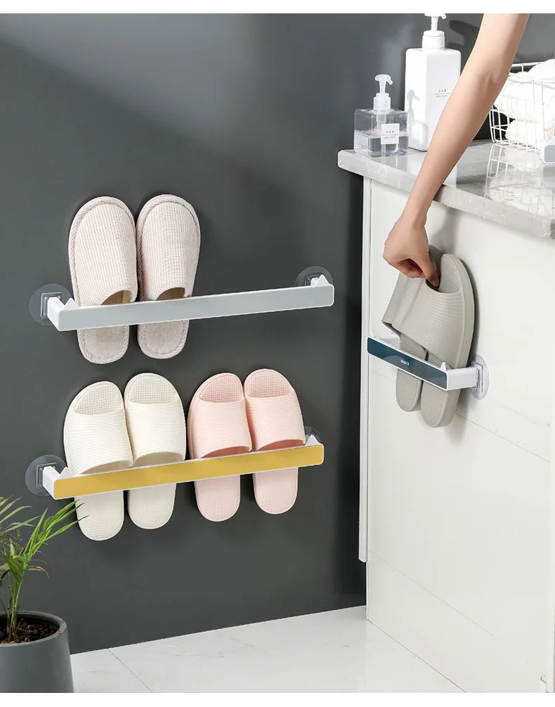 

Bathroom slippers rack free punching wall hanging household bathroom bath shoes drain water storage rack rack