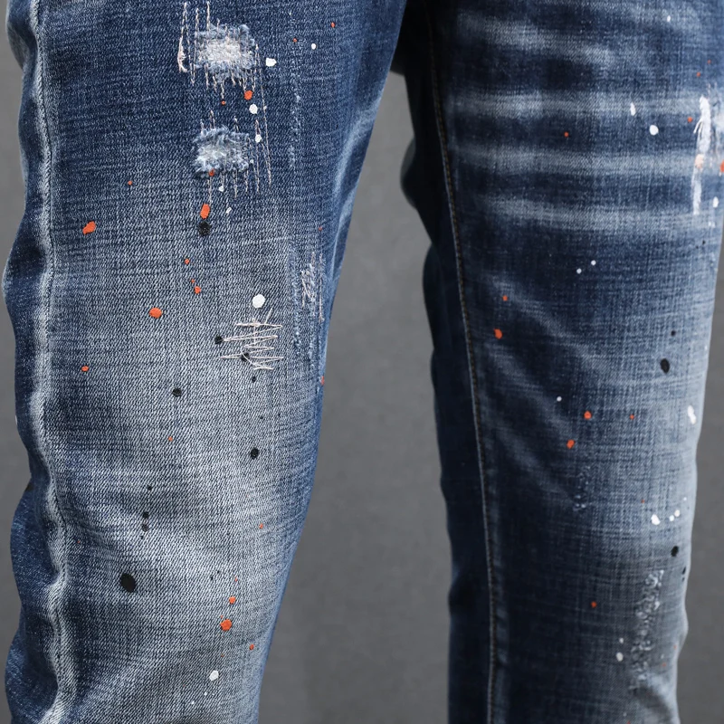 Newly Designer Fashion Men Jeans Retro Blue Elastic Embroidery Slim Ripped Jeans Men Hip Hop Painted Vintage Denim Pants Hombre