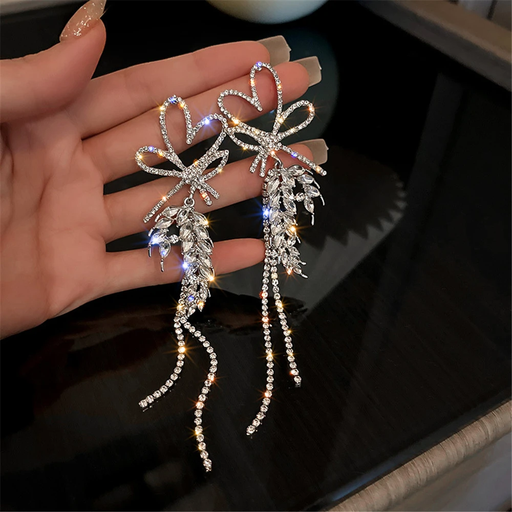 Купи JURAN 2023 New Long Crystal Tassel Drop Earrings For Women Luxury Shine Rhinestone Weddings Party Jewelry Gift Dangle Earrings за 271 рублей в магазине AliExpress