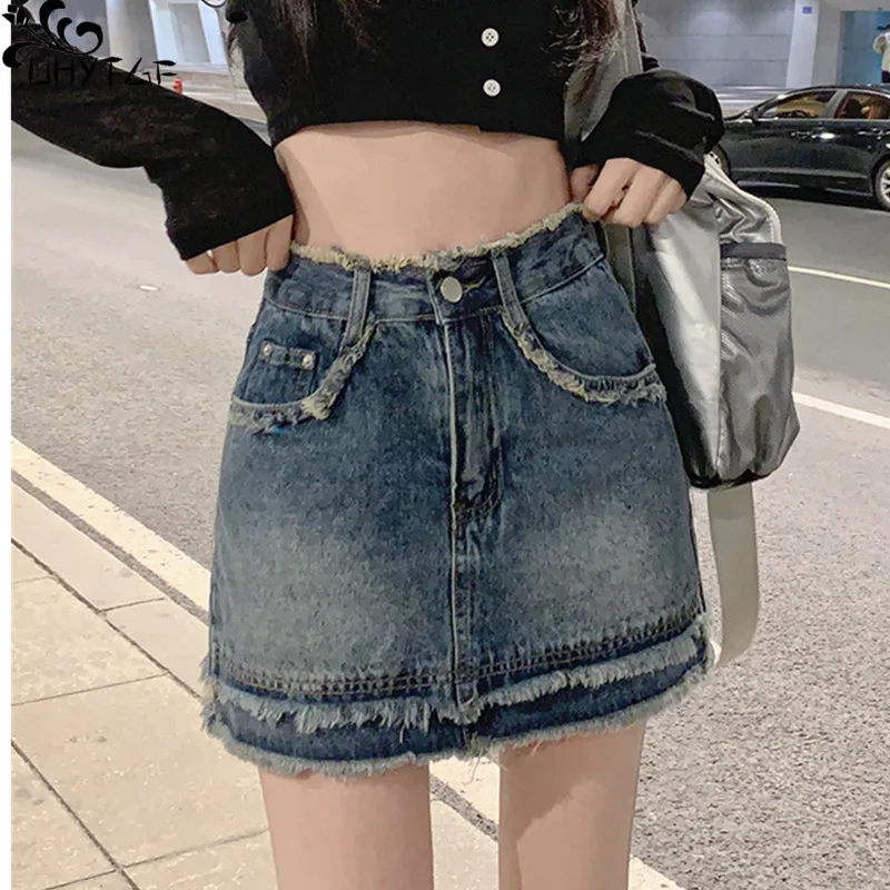 

UHYTGF High-Waisted Vintage Denim Short Skirt Women's Summer New Raw Edge A-Line Fashion Streetwear Ladies Cowboy Wrap Hip Skirt