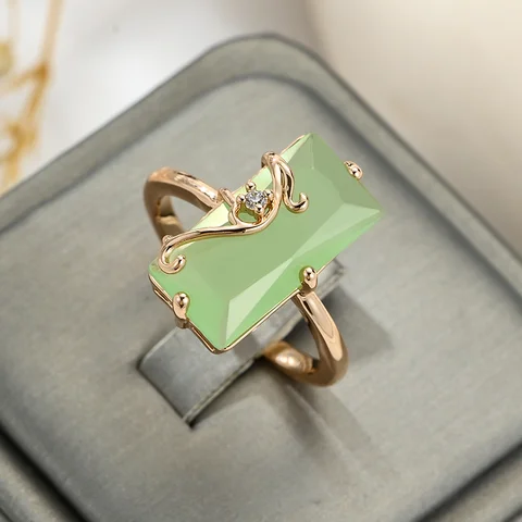 Кольца Wbmqda Fog зеленые цирконами медные покрытые розовым золотом 585