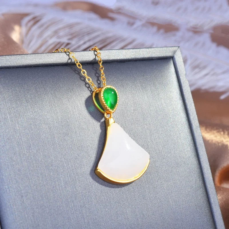 Женский ювелирный комплект из браслета и юбки