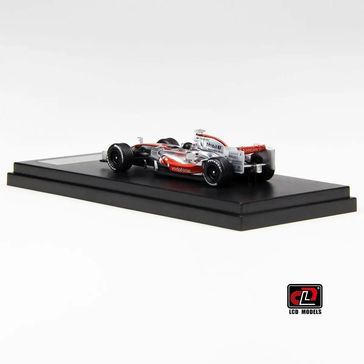 Фото Модель гоночного автомобиля McLaren MP4-23 в масштабе 1:64 из литого металла с ЖК-дисплеем №5