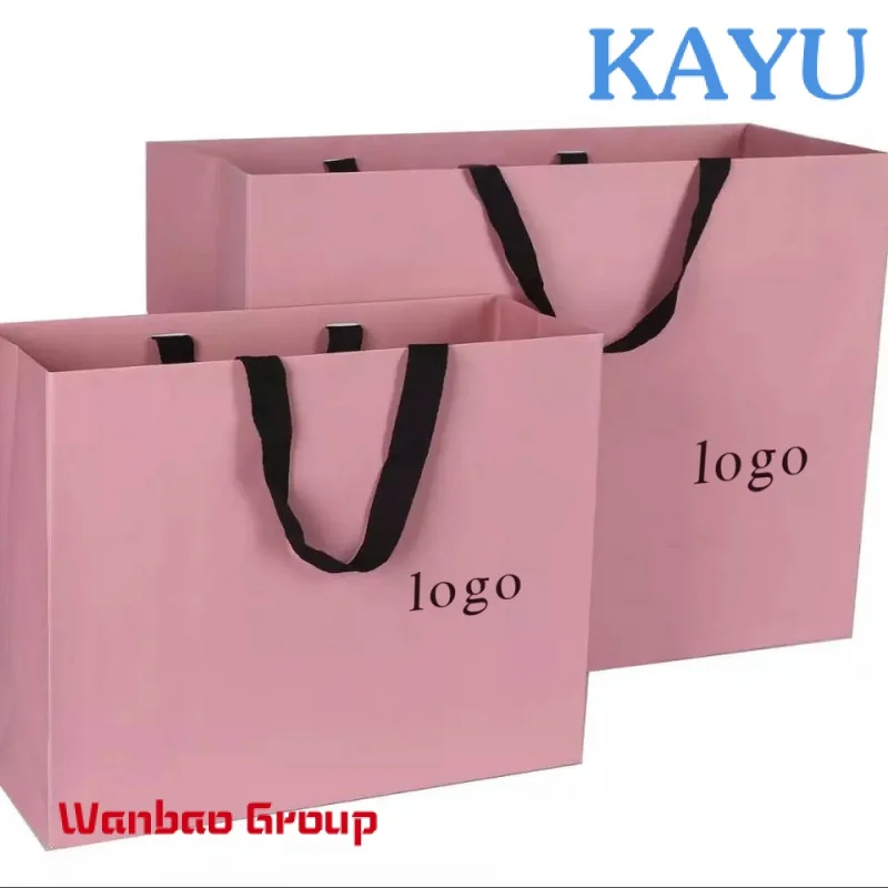 Luxury brand custom logo gift paper bag for clothes pink matte garment clothing boutique packaging bags with ribbon handles