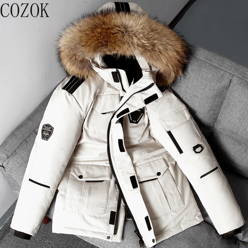 

Мужской пуховик средней длины, на белом утином пуху, с меховым воротником