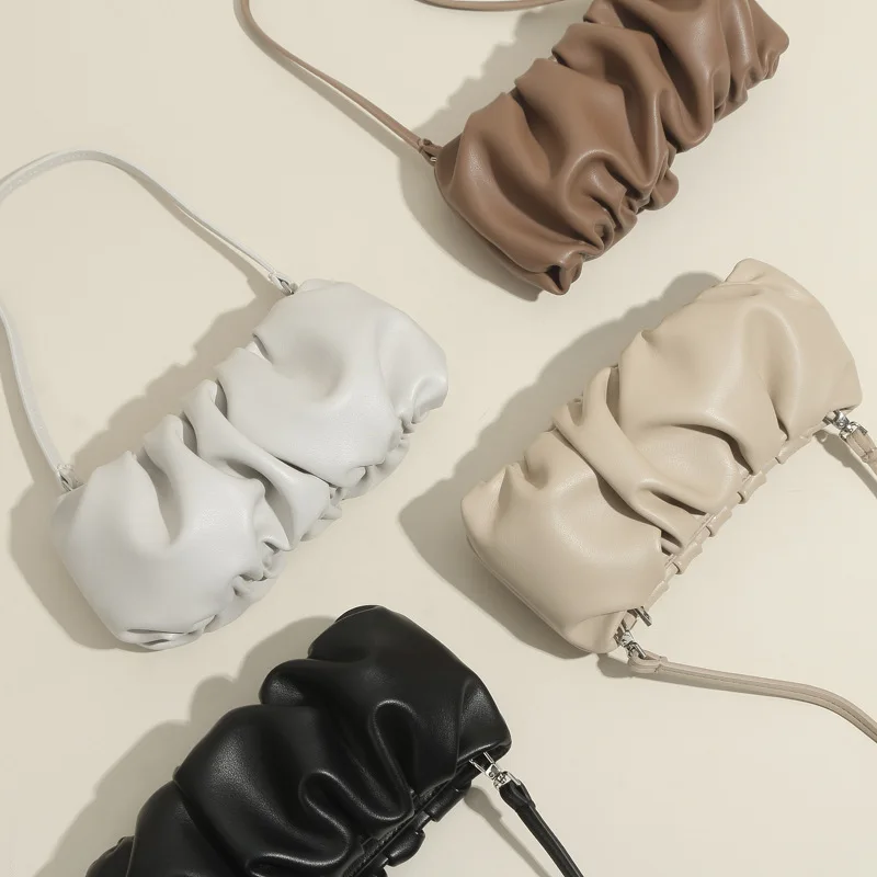 

2023 summer new Europe and the United States niche style leather shoulder women's bags new tide pleated solid color dumpling bag