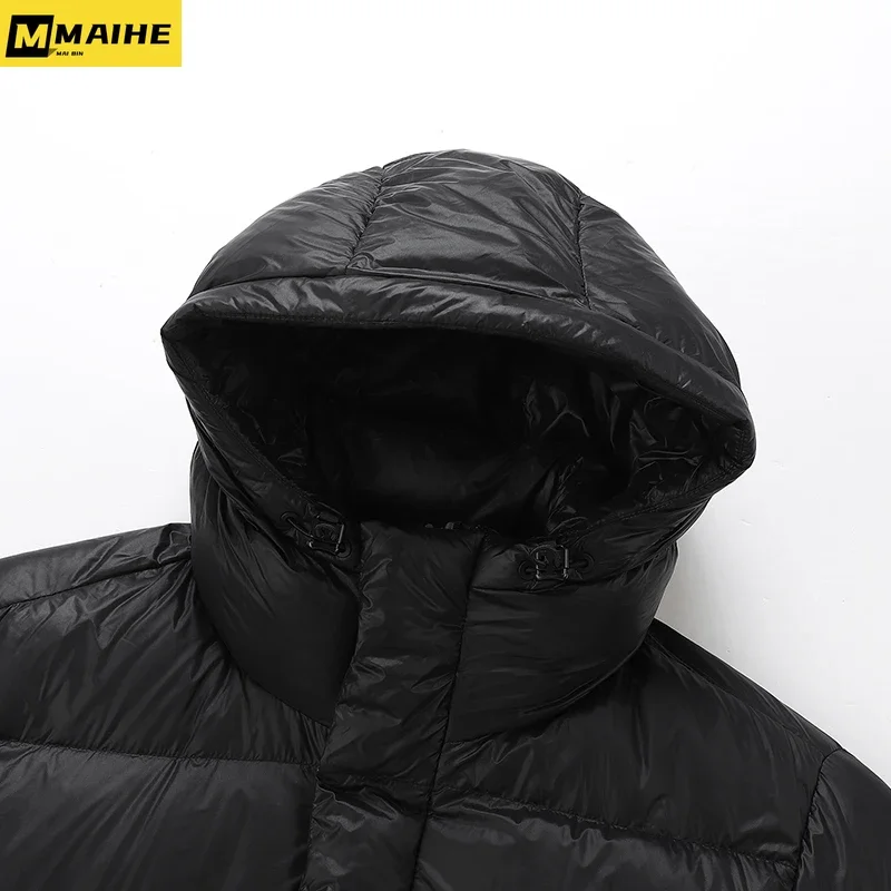 Пуховик зимний мужской средней длины с капюшоном и утолщенной подкладкой